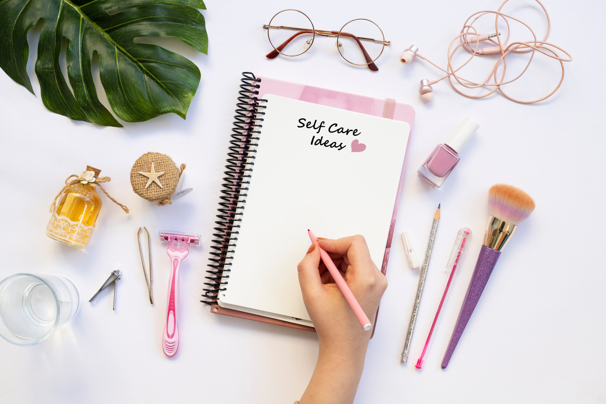 Self Care, wellbeing ideas, holistic set of self-care activities concept with open notebook